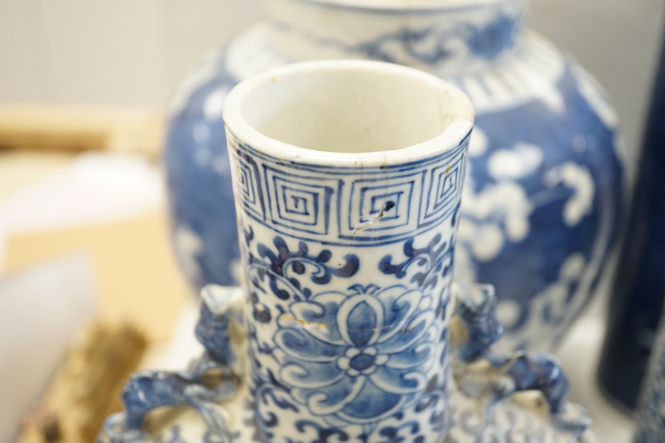 A Chinese blue and white Buddhist lion moon flask, a baluster vase, three sleeve vases and two others, 19th century, tallest 33cms (a.f.)